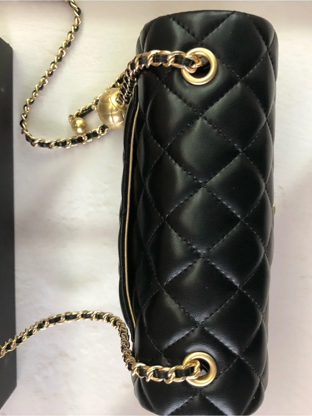 CHANEL Black Quilted Lambskin Mini Flap Bag with Gold Chain